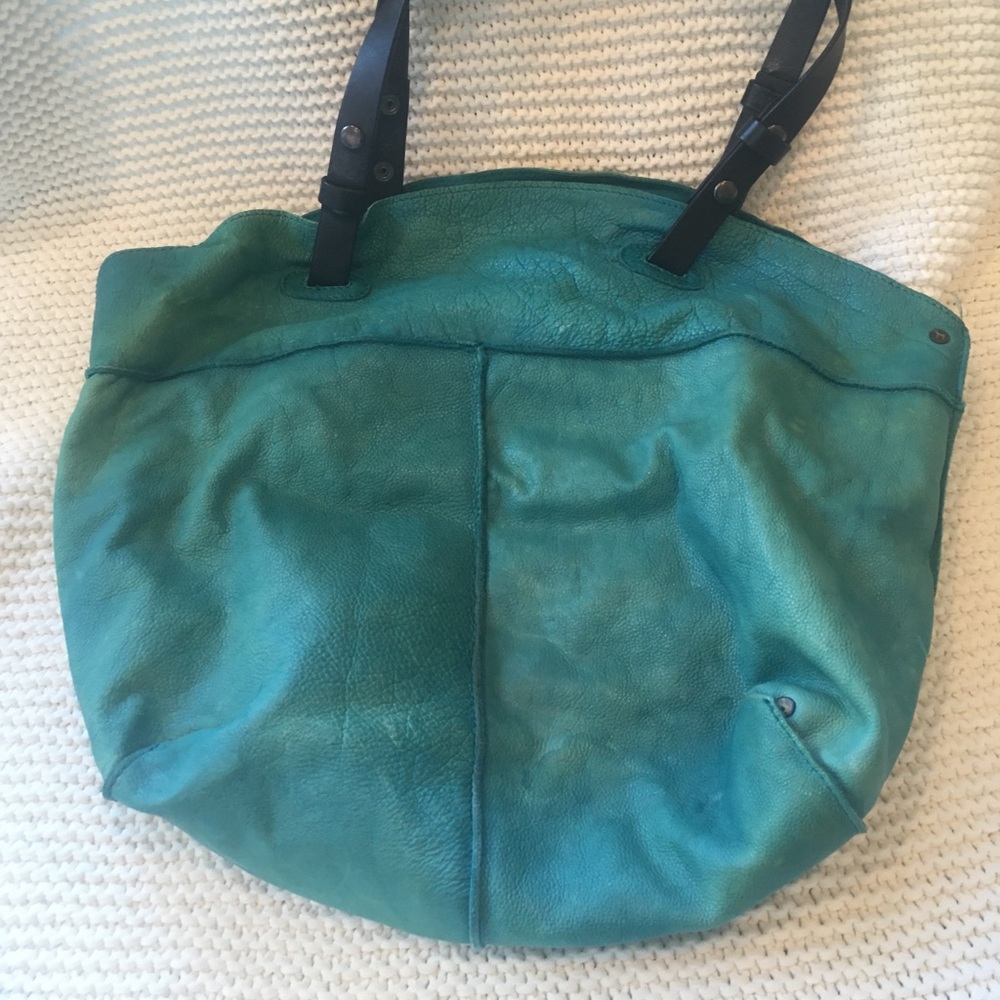 Holding Horses bright teal leather handbag